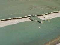 Delamination, peeling of paint layer and paint loss